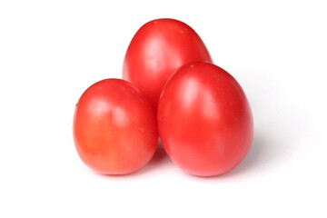 Ripe red tomatoes on white background