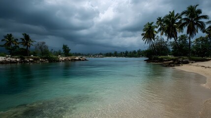 Tropical paradise beach with calm turquoise water and palm trees beneath ominous storm clouds