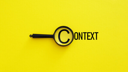 Contextual advertisement or conversation. A magnifying glass is positioned over the word Context