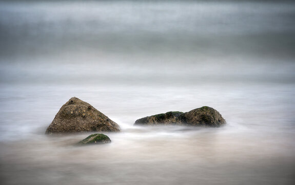 Stones, stick, out, of, the ,sea.,