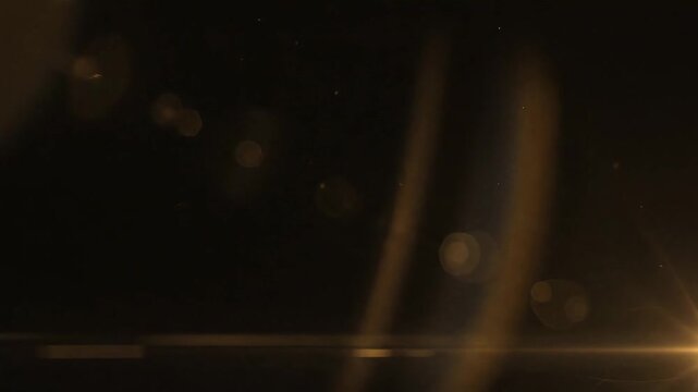 Vintage film reel overlay with dust and light leaks drifting across frame for editors or event openers about retro transitions and title reveals for trailers or social reels or festival bumpers