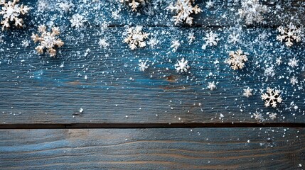 Christmas Wooden Background with Snow and Golden Snowflakes Winter Holiday Season Concept Blue Rustic Texture Top View with Empty Space for Greeting Card or Banner Design