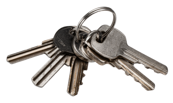Close-up of several metal keys attached to a keyring