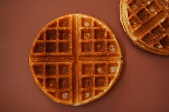 Homemade Belgian waffles isolated, selective focus