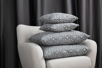 sofa cushions and bedspreads made of tapestry on a sofa or armchair, variegated fabric