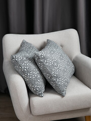 sofa cushions and bedspreads made of tapestry on a sofa or armchair, variegated fabric