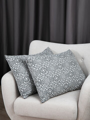 sofa cushions and bedspreads made of tapestry on a sofa or armchair, variegated fabric