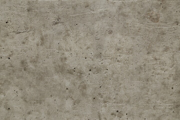 Rough concrete surface featuring numerous small holes