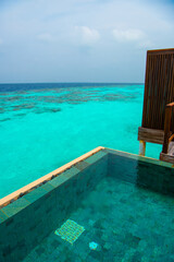 Tranquil closeup calm sea water waves with palm trees. Beautiful Panorama, Tropical island beach landscape exotic shore coast. Summer vacation, holiday amazing nature. Relax paradise, Maldives.