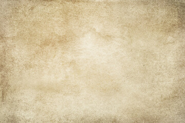 Grunge beige aged paper or parchment texture.