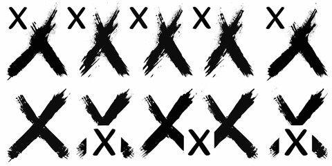 Collection of black brush stroke xs and small xs on a white background