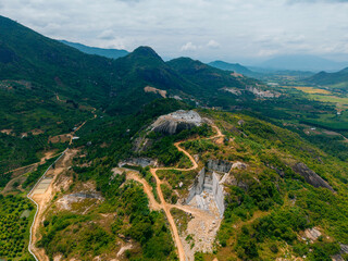 Aerial view of stone and marble quarry in mountainous landscape