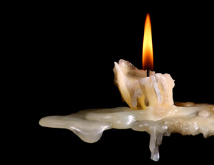 burning candles on a dark background