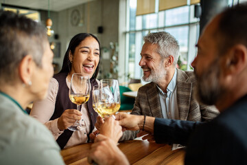 Diverse business colleagues having a meeting in a cafe