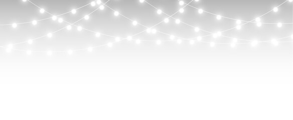 Holiday bright festive garland with light string and glowing decorative lamps.