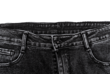 Piece of black torn denim on a white background. Denim texture