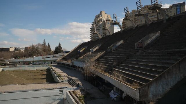 sunny day tbilisi city center famous abandoned old open swimming pool slow motion panorama 4k georgia