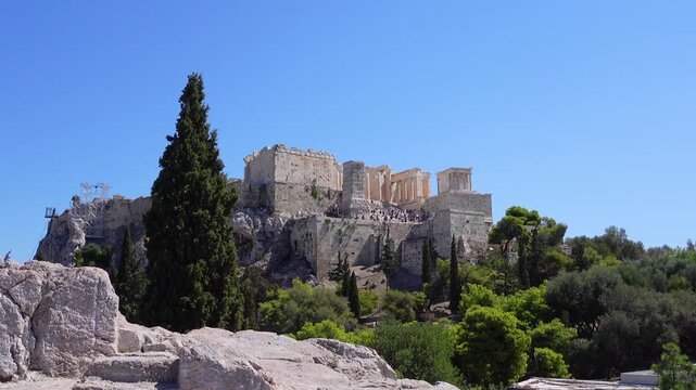 Tourists at the Acropolis Hill in Athens, Greece