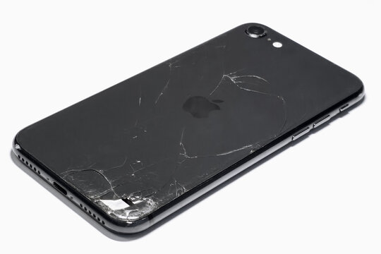 Broken iPhone Back with Shattered Glass and Apple Logo