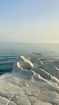White limestone rocks texture in Sicily, typical rocks and the sea of Eraclea minoa near Agrigento.