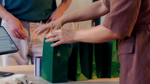 Close-up 4K Ultra HD footage of a customer making a credit card payment at a retail store checkout, showing contactless transaction, modern shopping experience, and consumer lifestyle.