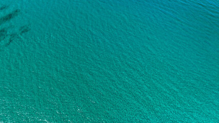 Aerial view of the clear turquoise sea. Ideal for backgrounds, textures and patterns.