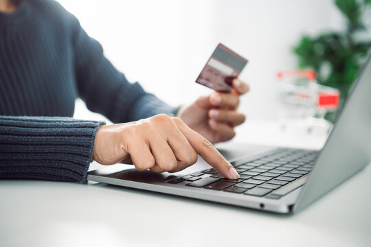 Online shopping payment with credit card on laptop concept of e-commerce digital transaction secure online payment and modern consumer lifestyle