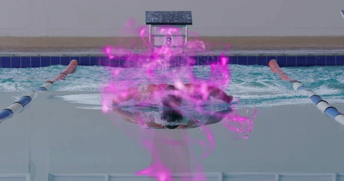 Swimming butterfly stroke cutting through water near lane ropes, block 8, with purple digital glow
