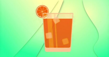 Displaying glass holding orange drink at abstract background, with ice cubes, straws, orange slice