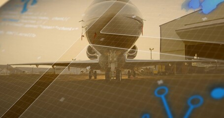 Fototapeta premium Presenting commercial jet sitting head-on on tarmac at golden hour, with hangar, map interface