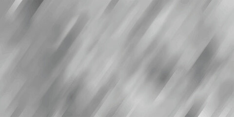 Obraz premium Dynamic diagonal streaks of gray and white create a sense of motion and depth in this abstract blurred background, ideal for technology or industrial themes