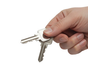 Hand holding silver keys isolated on a transparent background