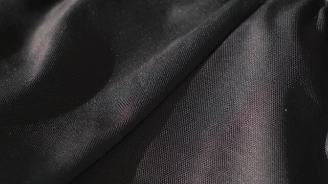 Close-up of the mesh texture of a polyester or elastane fabric
