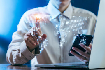 Digital interaction with global connections in a modern workspace during the evening