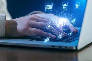 Hands typing on a laptop with artificial intelligence icons and data symbols at night