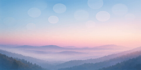 Scenic view of sunrise over misty mountains with a blue sky, offering a beautiful landscape of nature and fog in the morning dawn