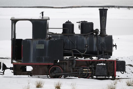 Historic mine railway in winter landscape, Kongsfjord, Ny-&Aring;lesund, Spitsbergen Island, Svalbard and Jan Mayen archipelago, Norway