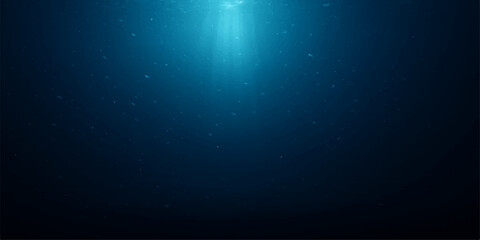 Abstract blue background with glowing rays of sunlight filtering through deep ocean water © maria