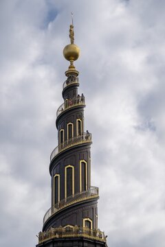 Corkscrew-shaped tower of the Evangelical Lutheran Church of the Saviour, in front of Frelsers Kirke, Christianshavn, Copenhagen, Denmark