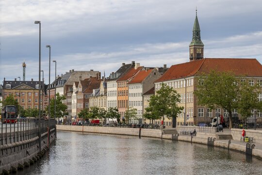 View from the bridge H&oslash;jbro, Slotsholm Canal, Gammel Strand, to houses at Nybrogade, Copenhagen, Denmark