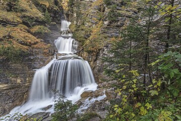 Waterfall in a gorge, cascades, autumn, Kuhflucht waterfall, near Oberau, Alpine foothills, Bavaria, Germany