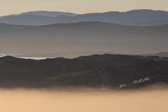 Hotel Arctic with igloos, midnight sun, summer, Ilulissat, Ilulissat Icefjord, Disko Bay, West Greenland, Greenland