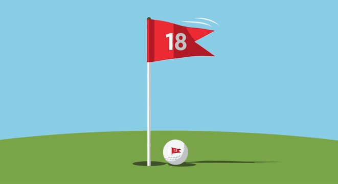 A golf ball rests on a green next to the 18th hole flag on a clear day.
