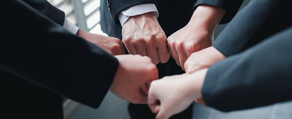 The power of the new generation, working as a team, joining forces to achieve goals. Businessmen,...