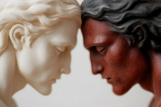 Two faces, different yet connected, eyes closed in contemplation. A serene and powerful juxtaposition of light and dark, unity and contrast. Timeless art.