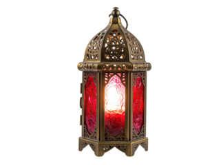 Ornate, antique lantern with red stained glass panels, illuminated from within, isolated on black