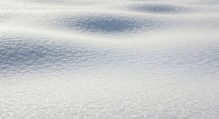 Close up of sparkling snow drifts with gentle curves and shadows Keywords: snow, winter, texture, background, white, cold, frost, ice, frozen
