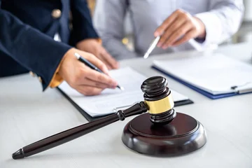 Fotobehang Muziek Consultation and conference of female lawyers and professional businesswoman working and discussion having at law firm in office. Concepts of law, Judge gavel with scales of justice  © Freedomz