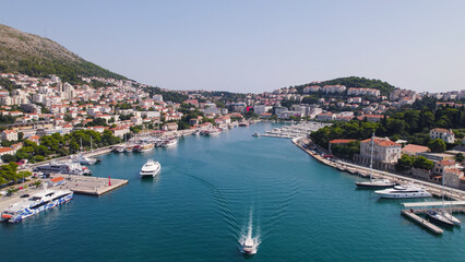 Fototapeta premium Aerial View of Dubrovnik Port with Boat on Adriatic Sea Croatia