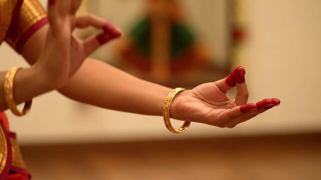 Close-up of a classical Indian dancer's expressive hand gestures (mudras).